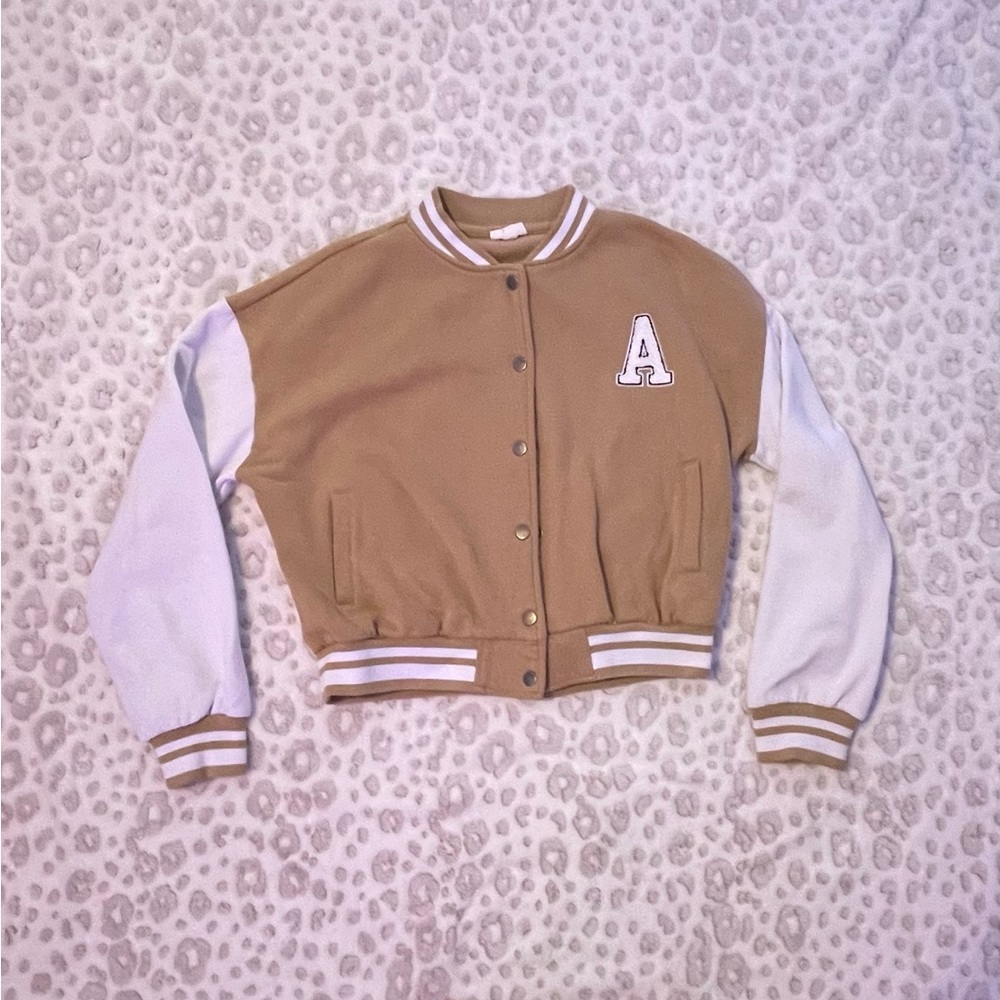 White and cream varsity jacket